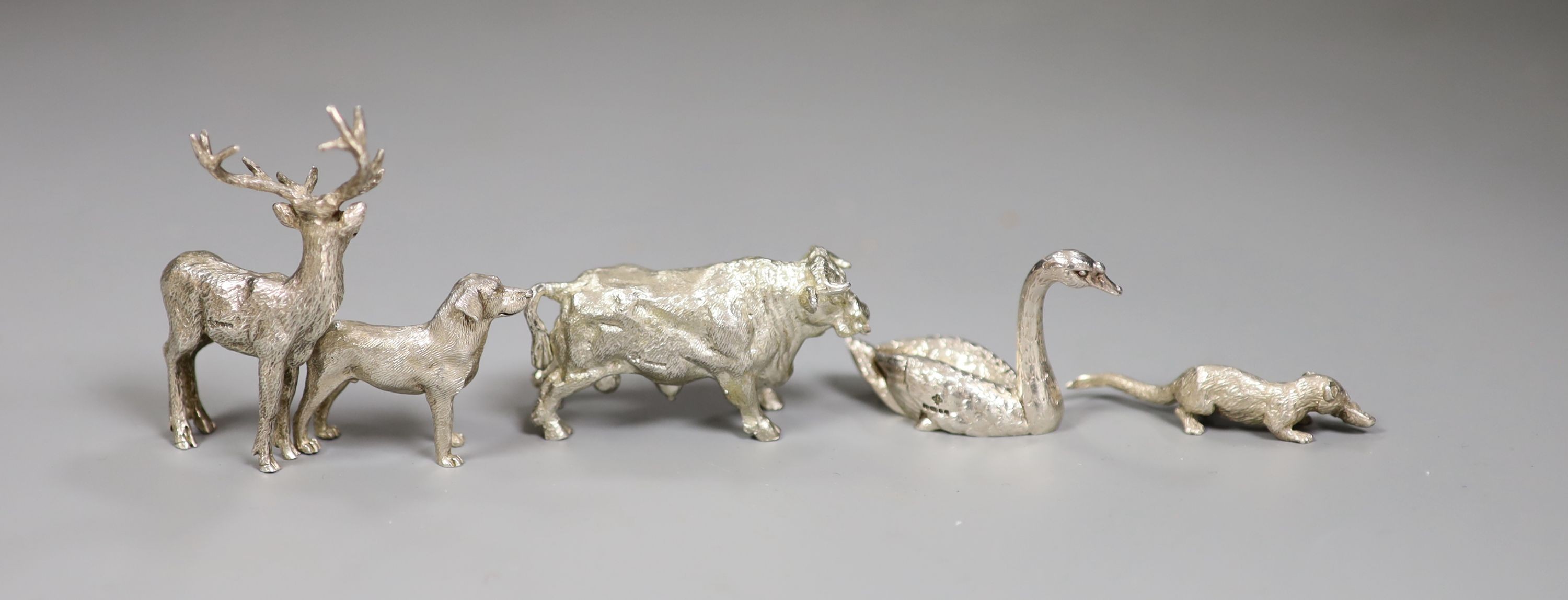 Five modern miniature silver model animals, including a stag, bull, dog, swan and otter with fish, maker SM J&J?, tallest 67mm, gross 9oz.